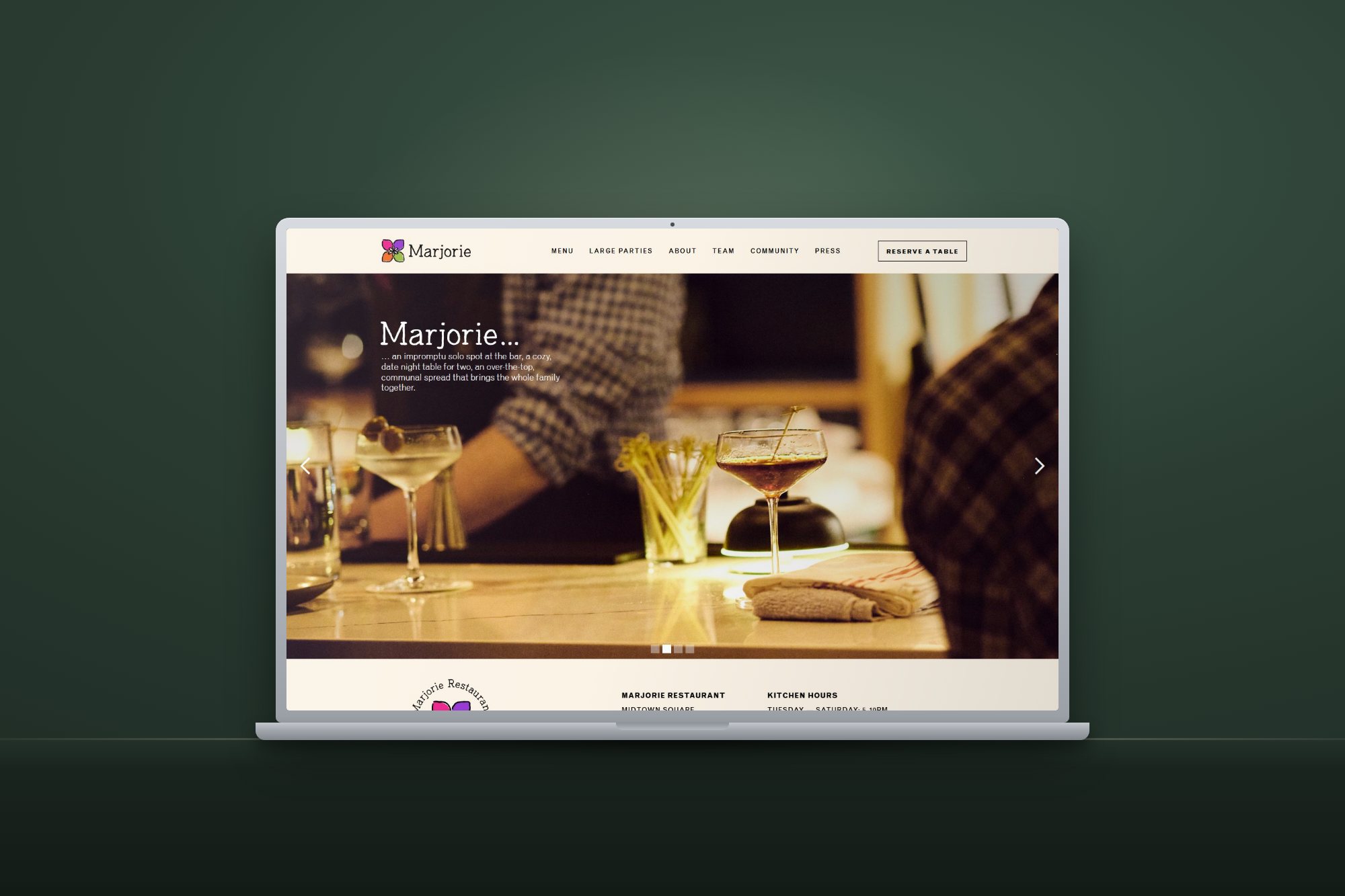 Marjorie website shown on a laptop